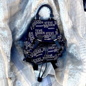 Steve Madden Black Nylon White Logo Cinch & Flap Top Back Pack w/ 4 Zip Pockets